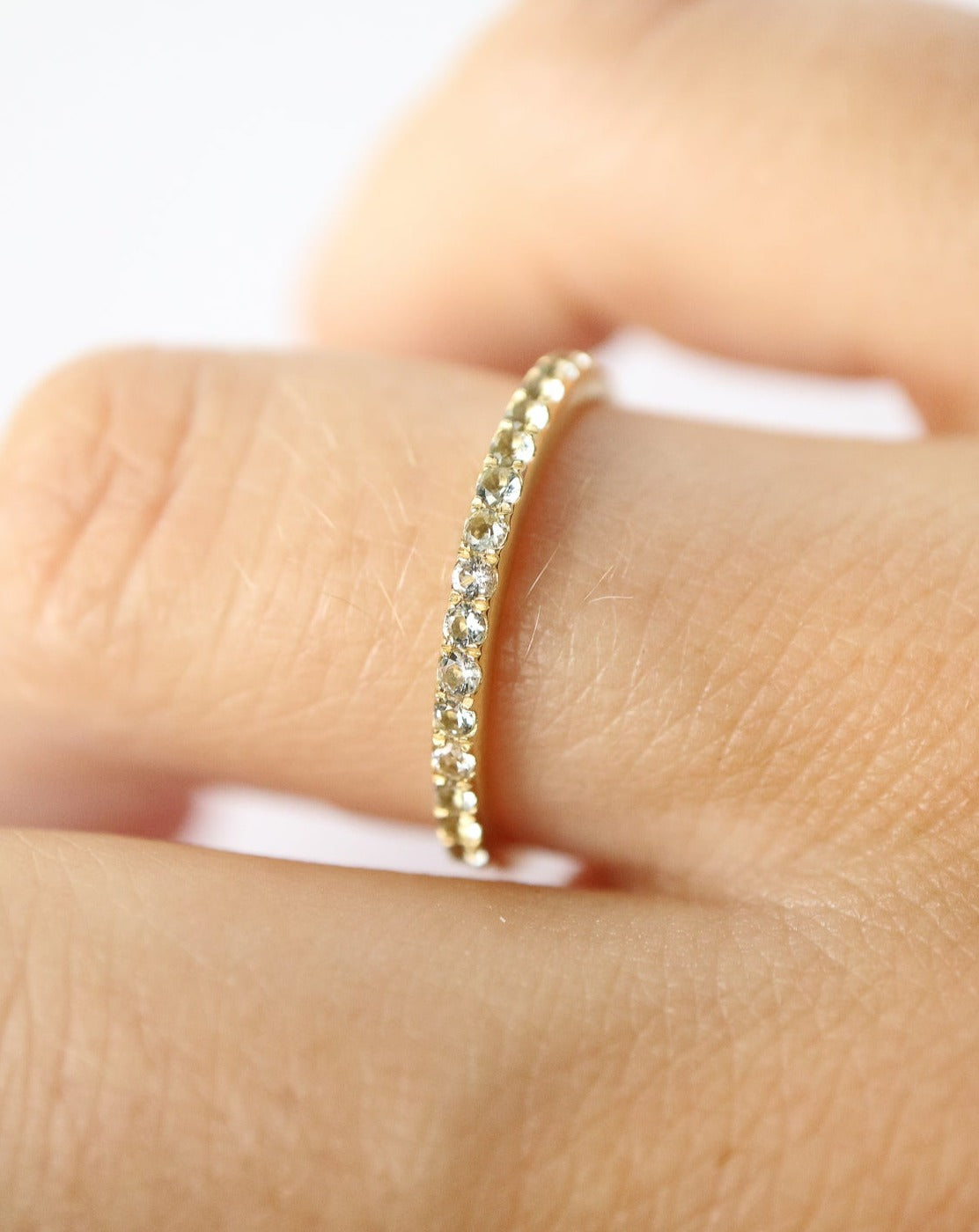 14kt gold Aquamarine half eternity ring from Collective & Co jewellery brand