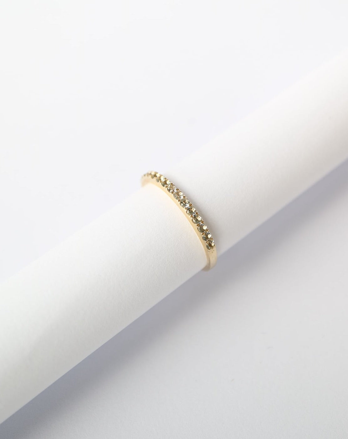 14kt gold Aquamarine half eternity ring from Collective & Co jewellery brand