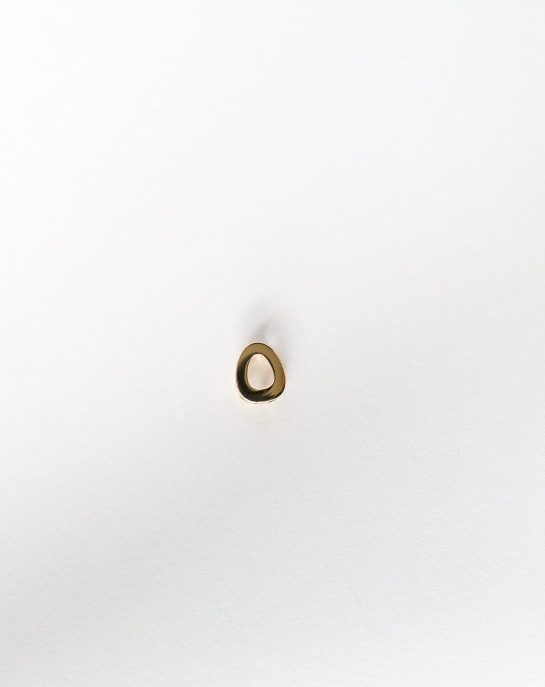 O initial charm letter pendant in 14kt gold