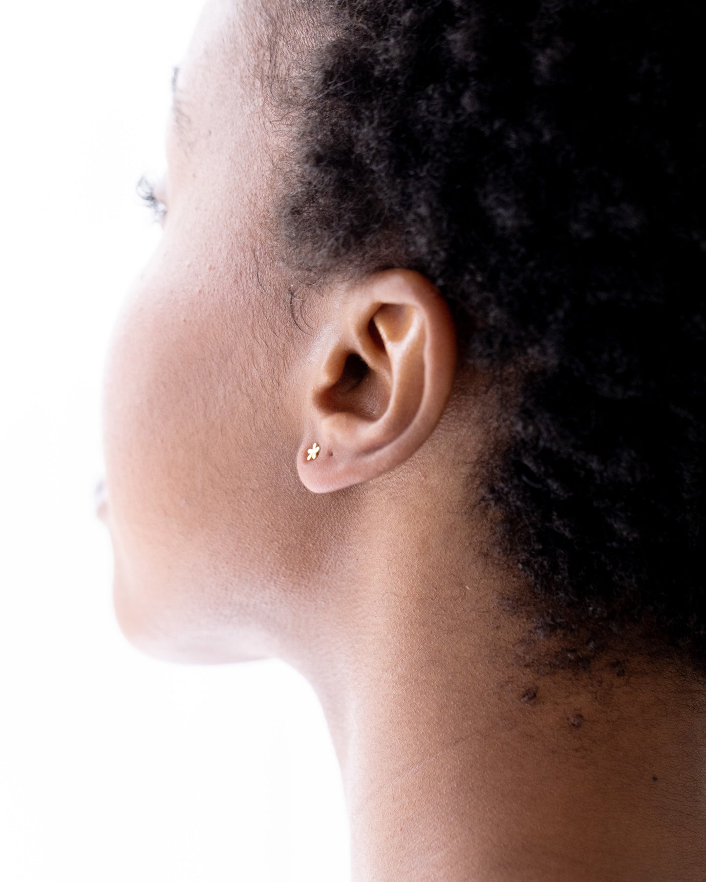 Teeny tiny flower studs from Collective & Co Jewellery