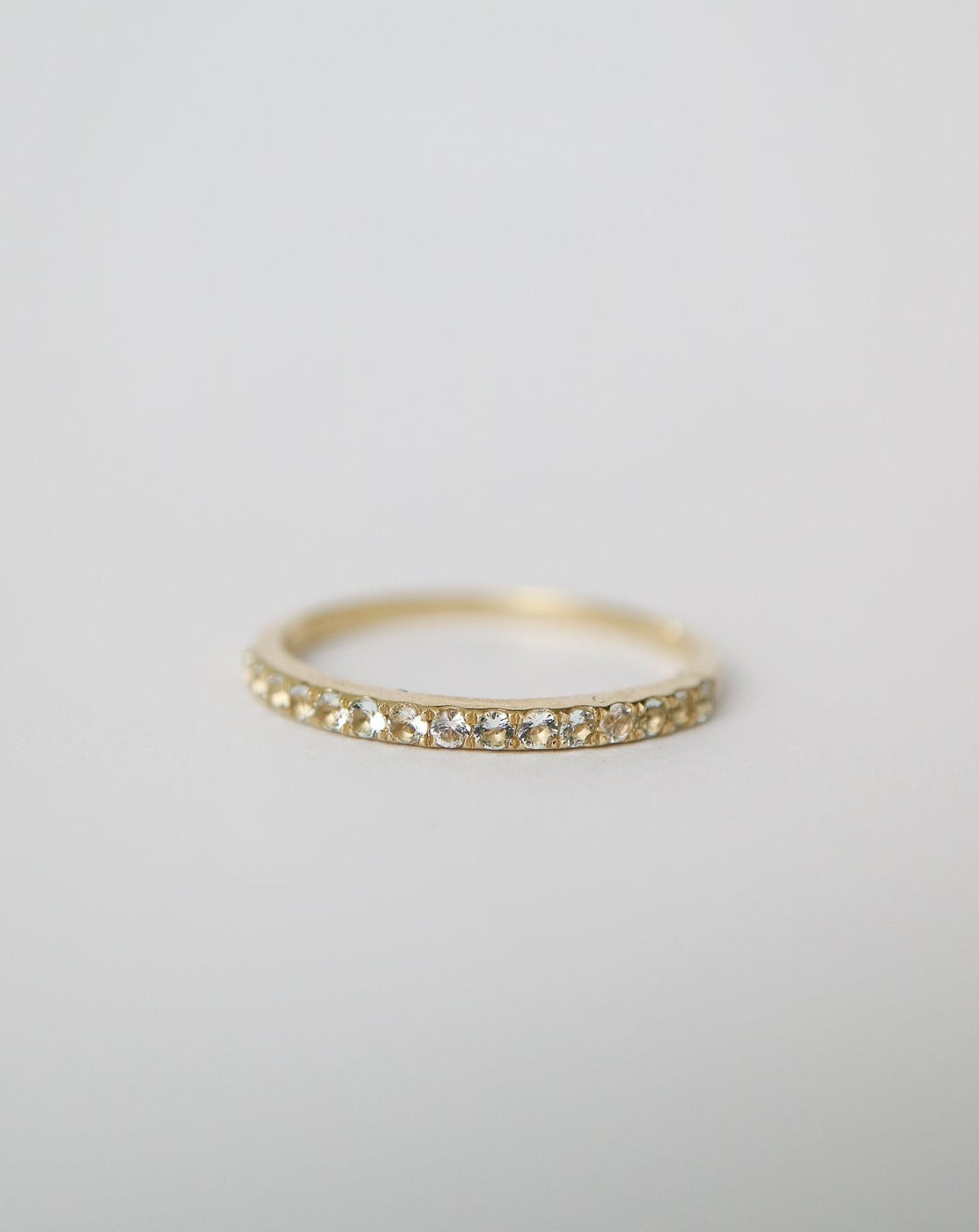 14kt gold Aquamarine half eternity ring from Collective & Co jewellery brand