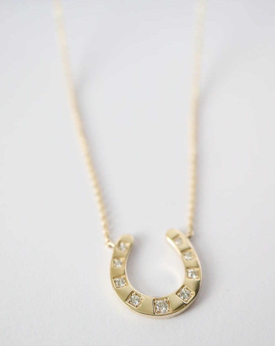 9kt gold and lab grown diamond horseshoe luck pendant necklace