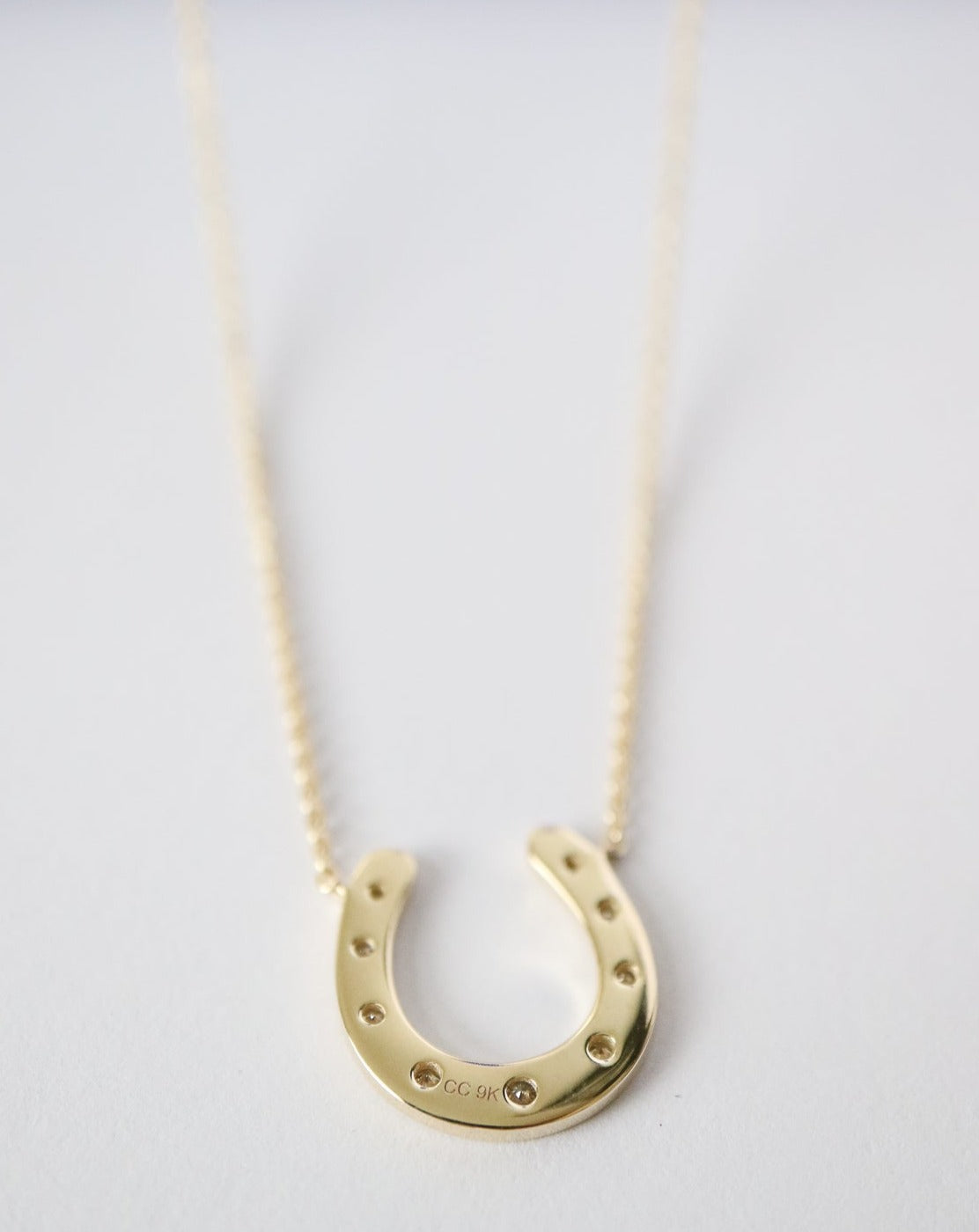 9kt gold and lab grown diamond horseshoe luck pendant necklace