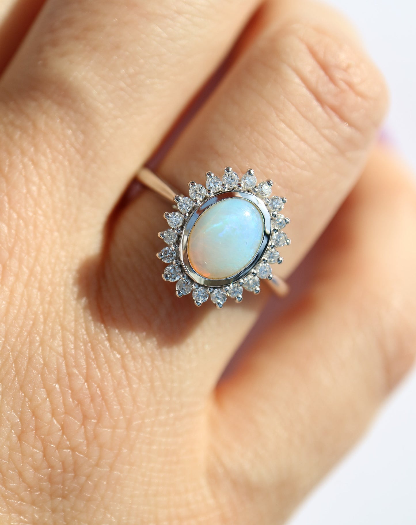 9ct white gold, opal and diamond halo statement ring