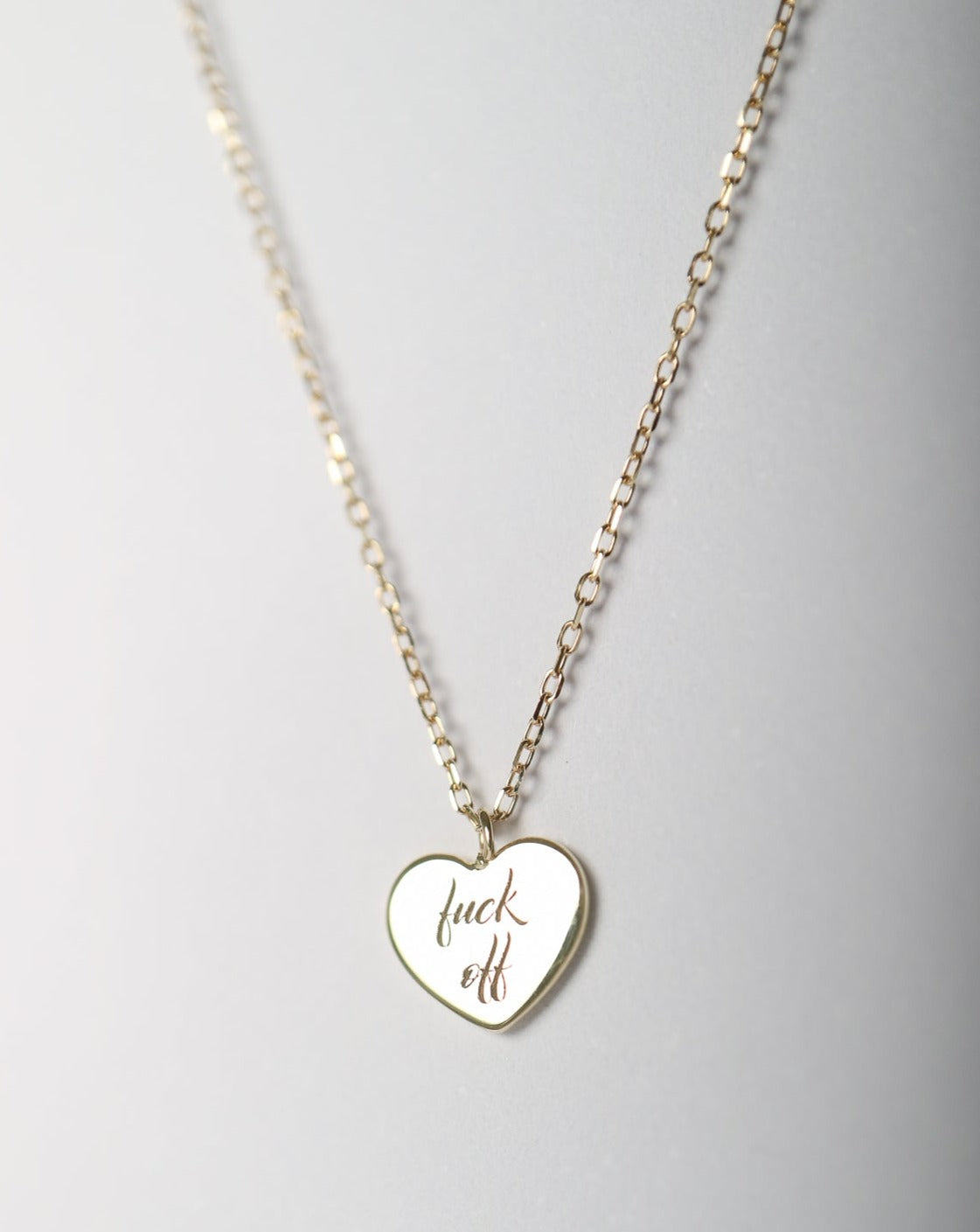 9kt gold Heart Pendant with "fuck off" engraved