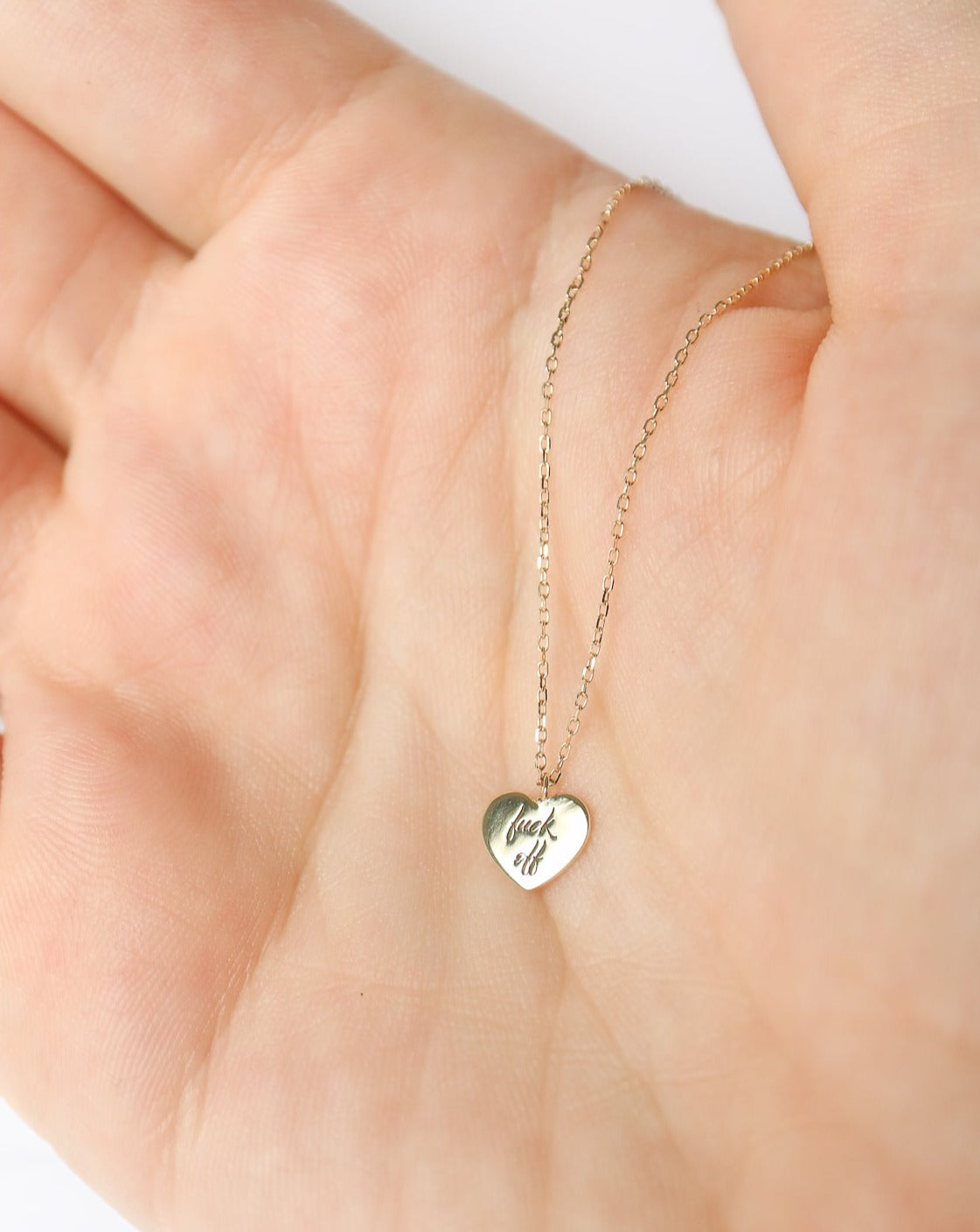 9kt gold Heart Pendant with "fuck off" engraved