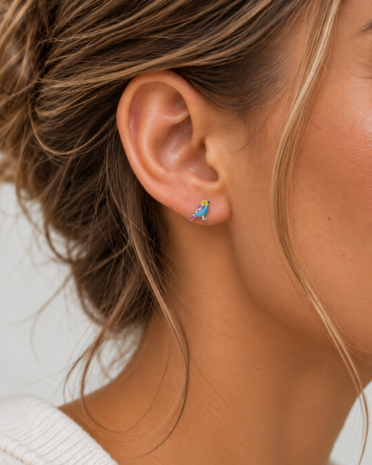 Lovebird Stud earring shown on female ear