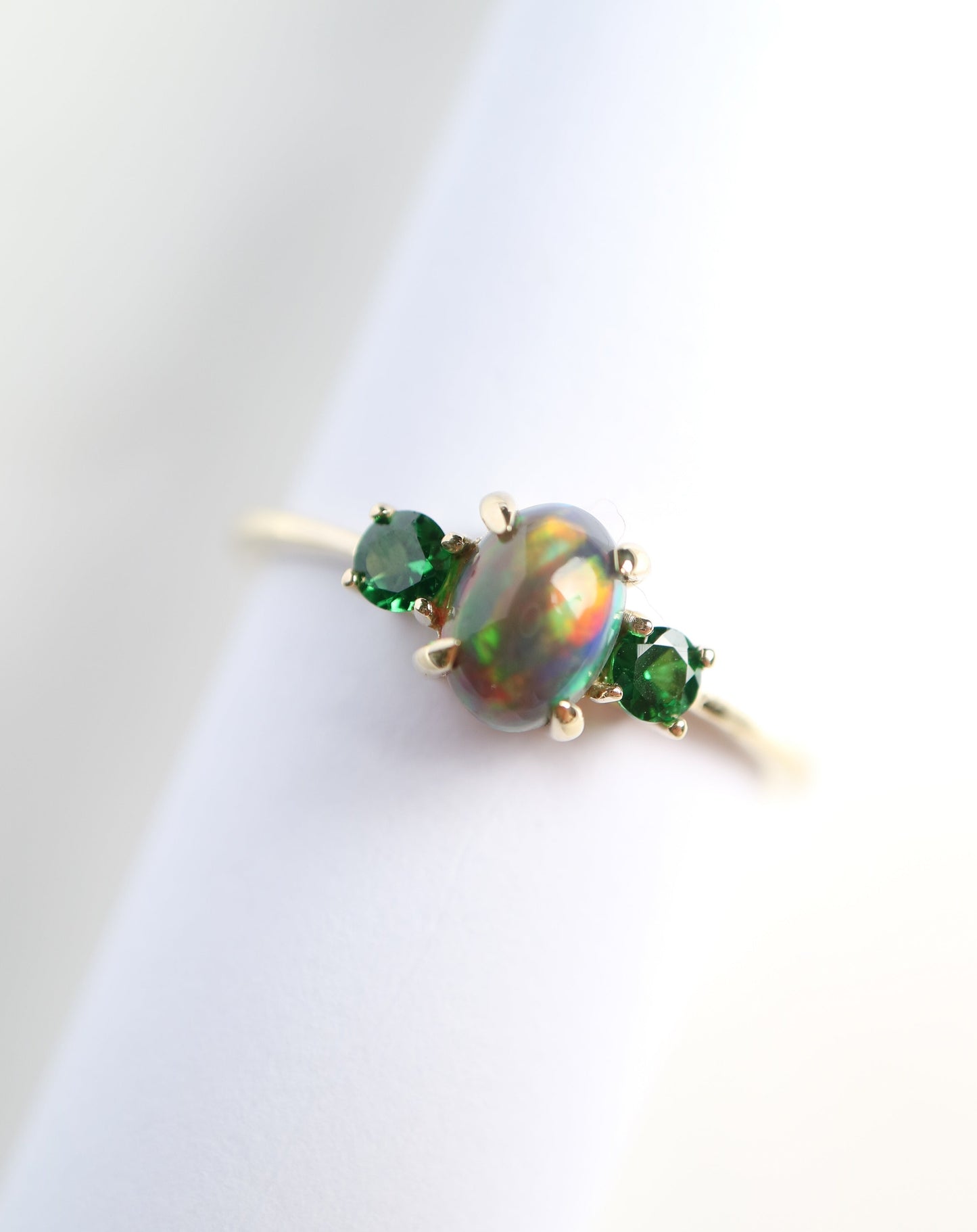 9ct gold ring with Ethiopian opal and tsavorite