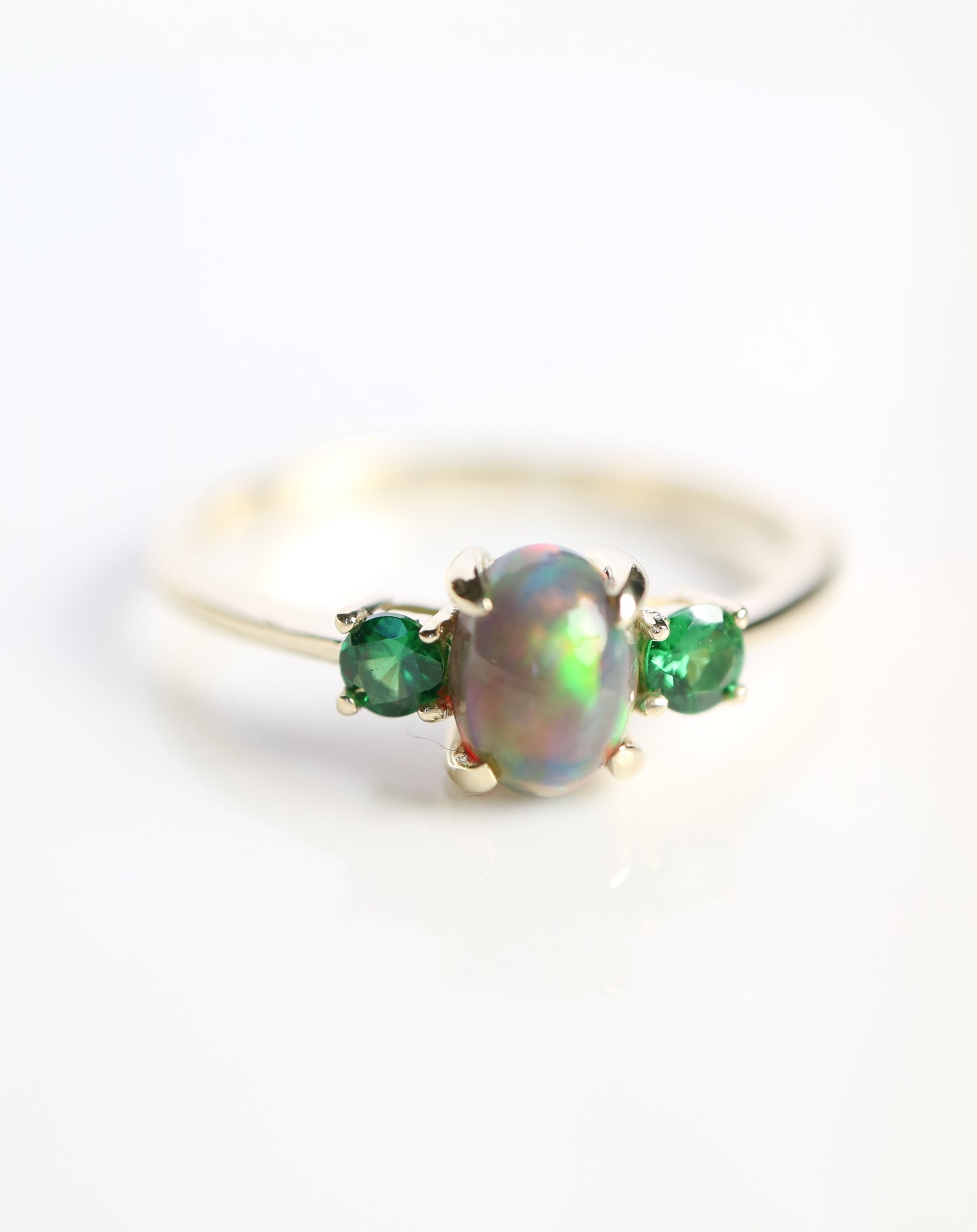 9ct gold ring with Ethiopian opal and tsavorite