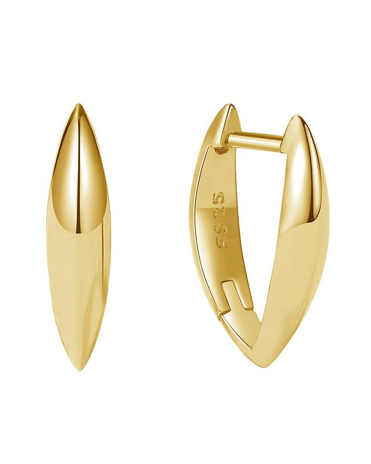 Gold hoop earrings on a white background