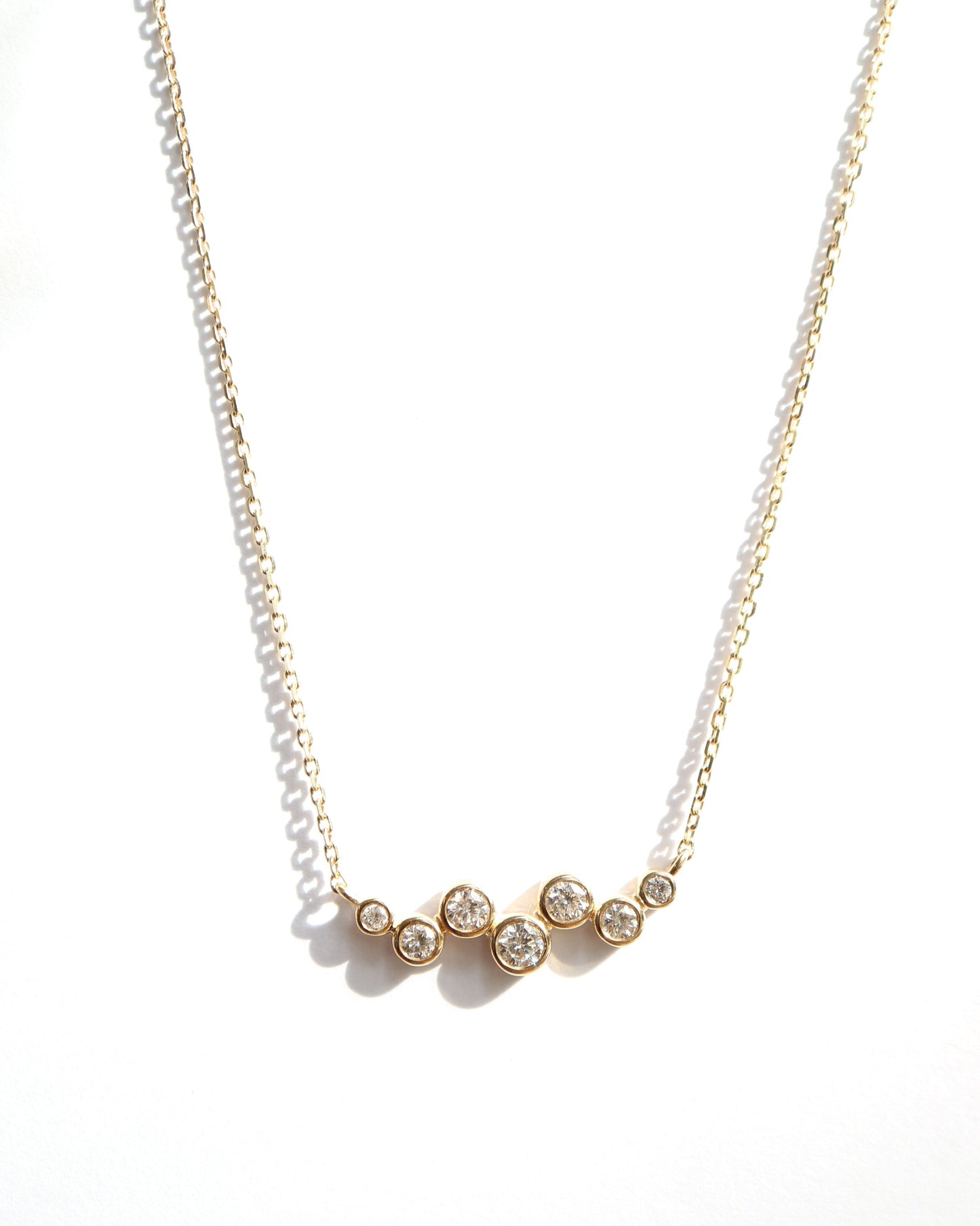 9ct gold necklace with seven round diamonds