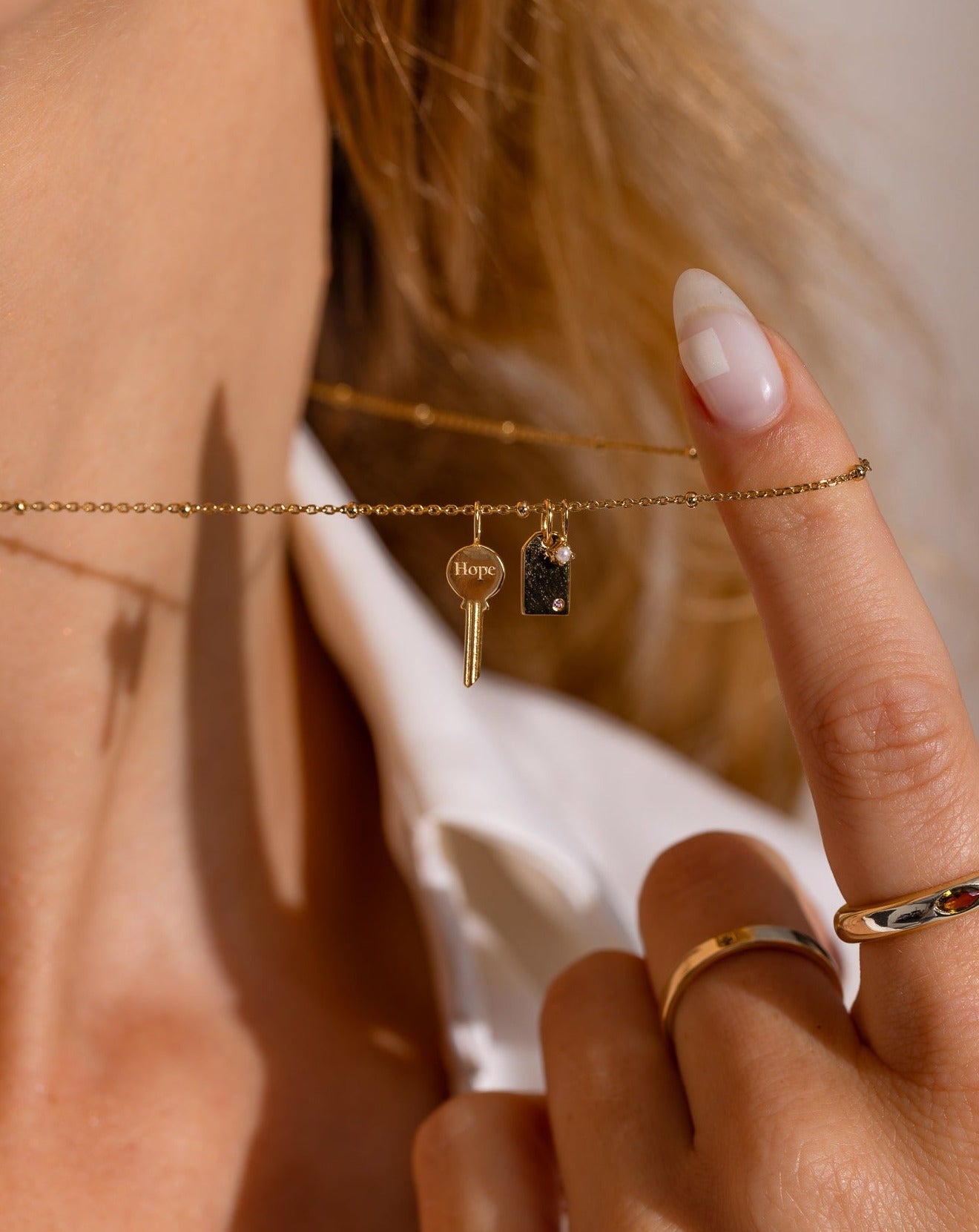 Key to Hope Necklace on female neck