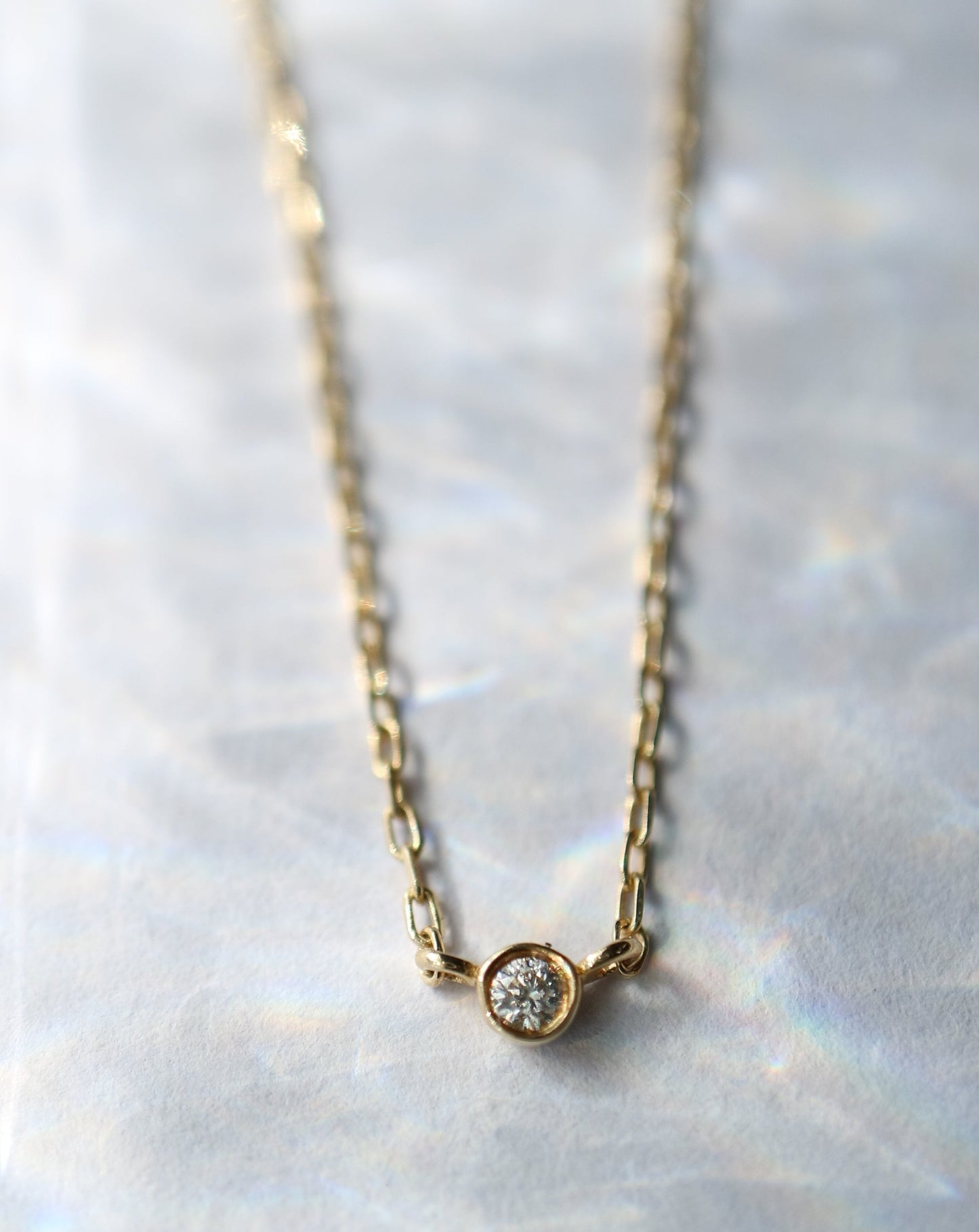 14kt gold Solo Diamond Pendant from La Kaiser Jewelry