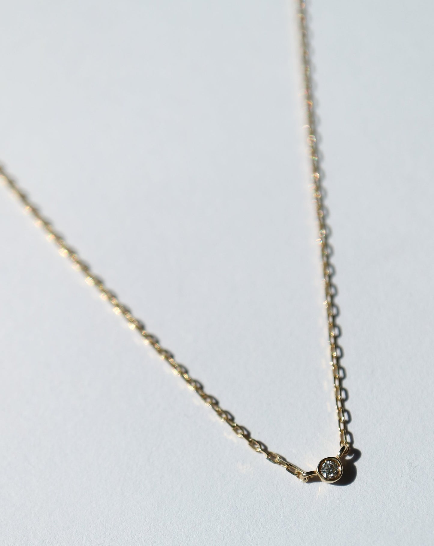 14kt gold Solo Diamond Pendant from La Kaiser Jewelry
