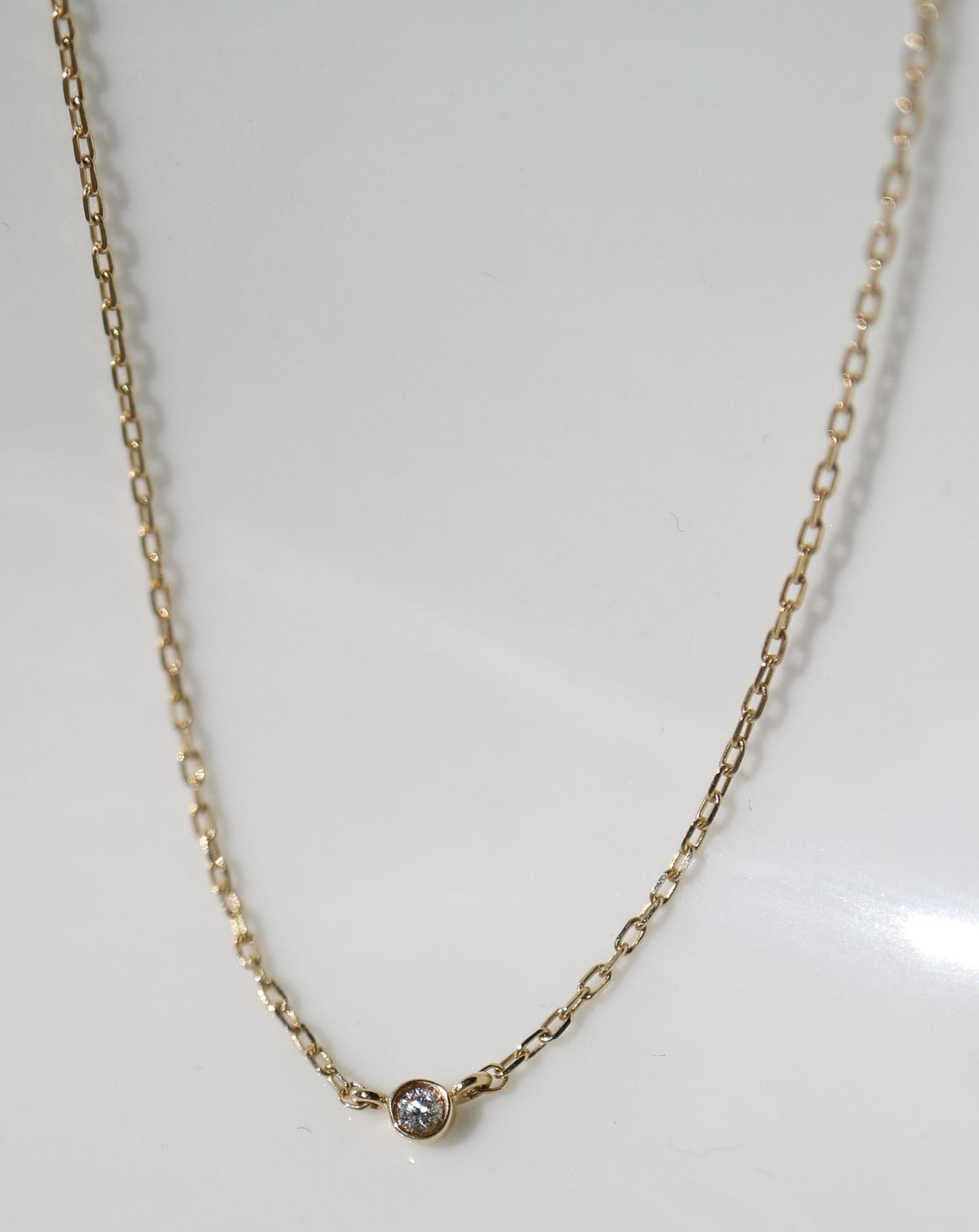 14kt gold Solo Diamond Pendant from La Kaiser Jewelry