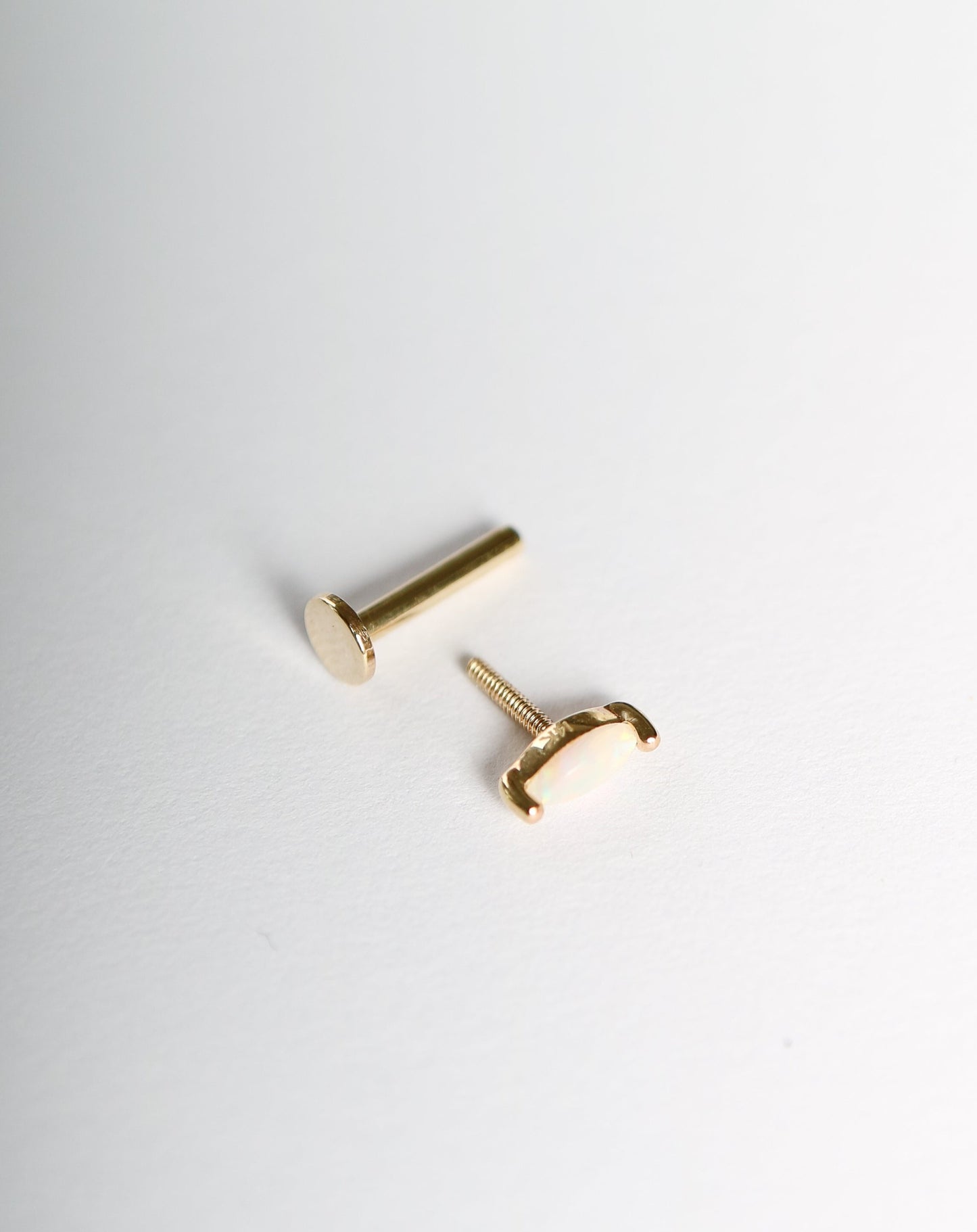 14kt Opal Conch Stud piercing