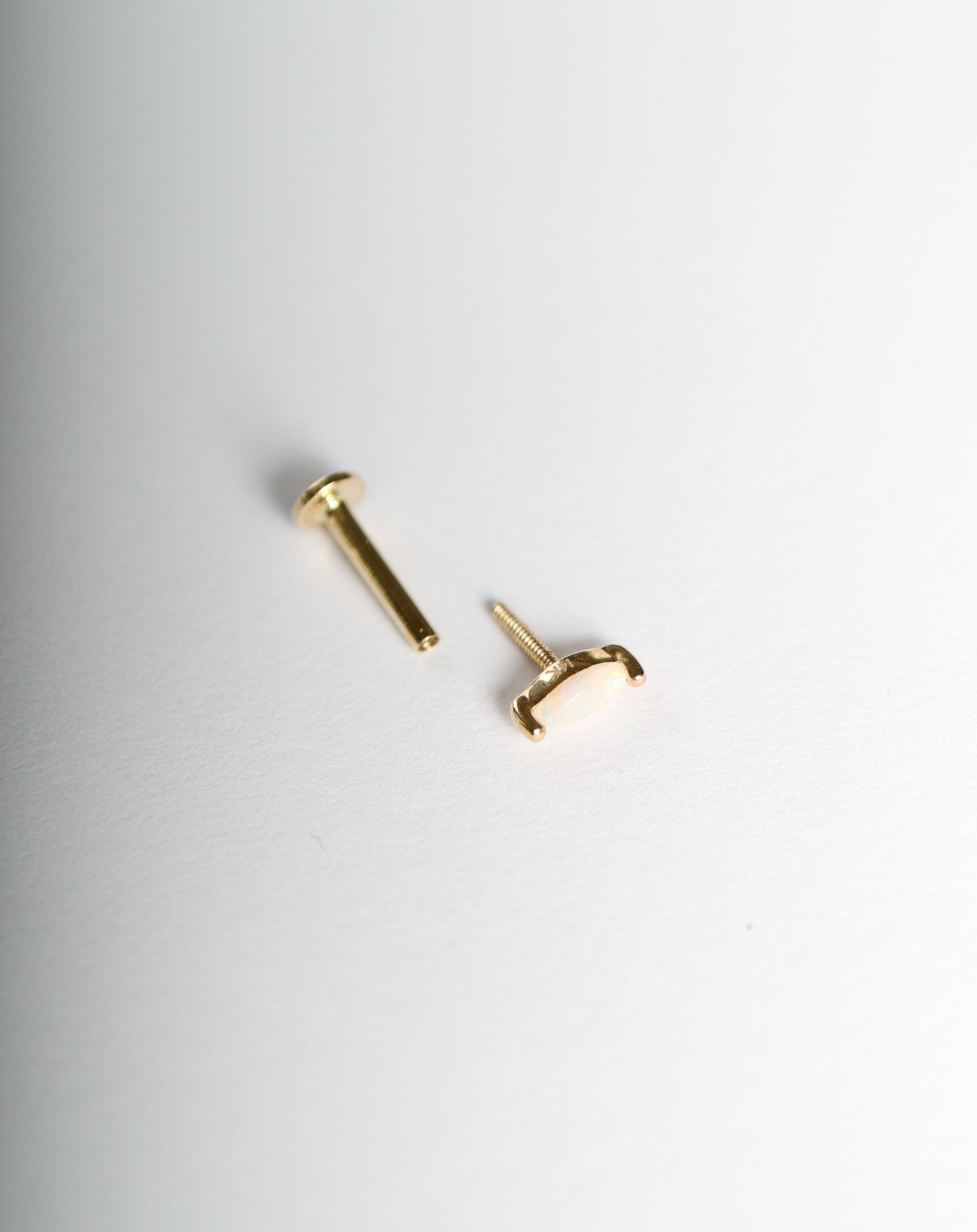 14kt Opal Conch Stud piercing