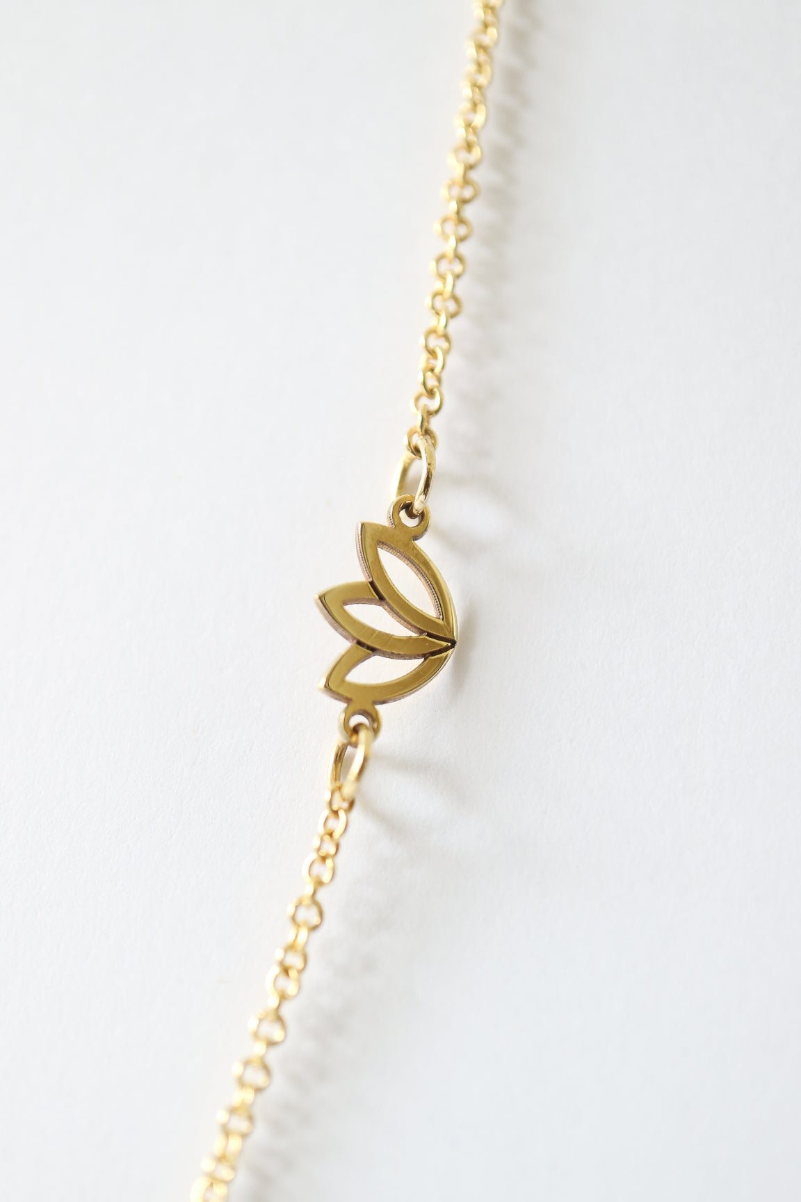 9ct gold necklace with three protea flowers from Collective & Co Jewellery