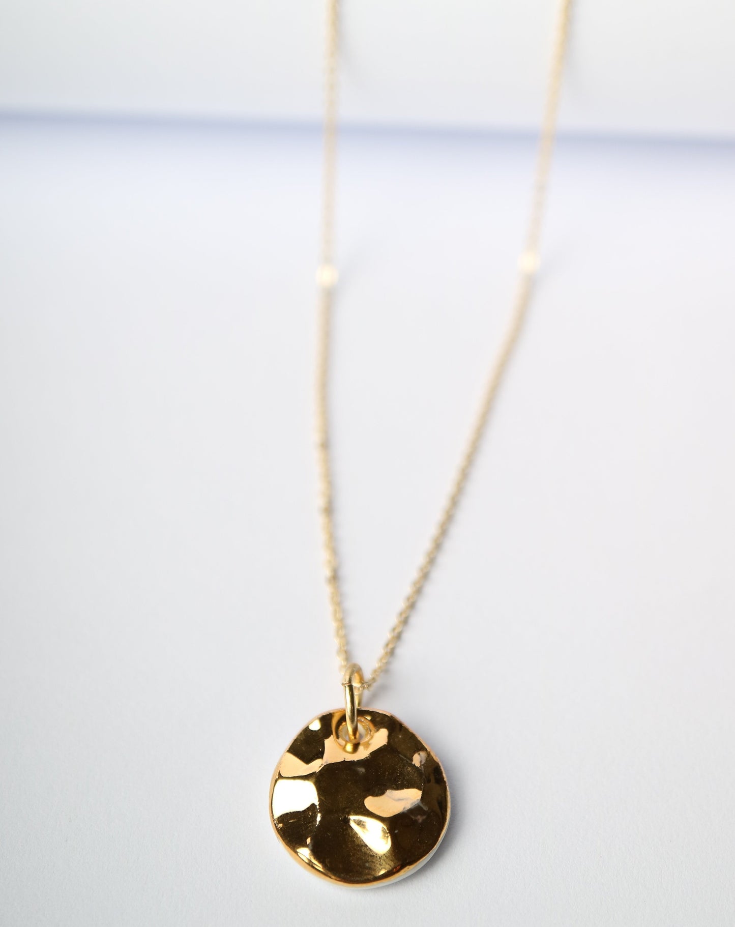Hammered Porcelain Necklace in gold