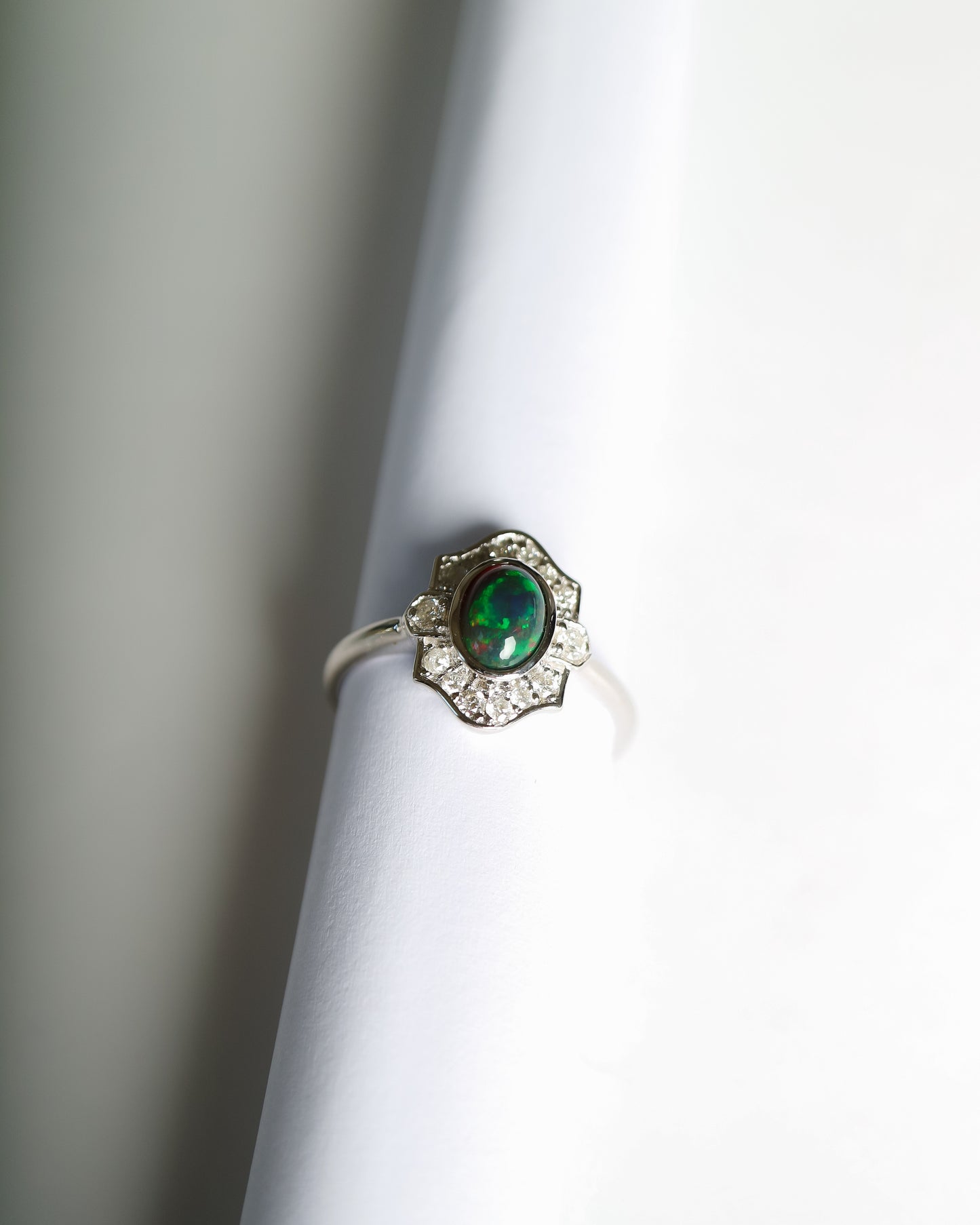 9ct white gold ring with Ethiopian opal and diamonds