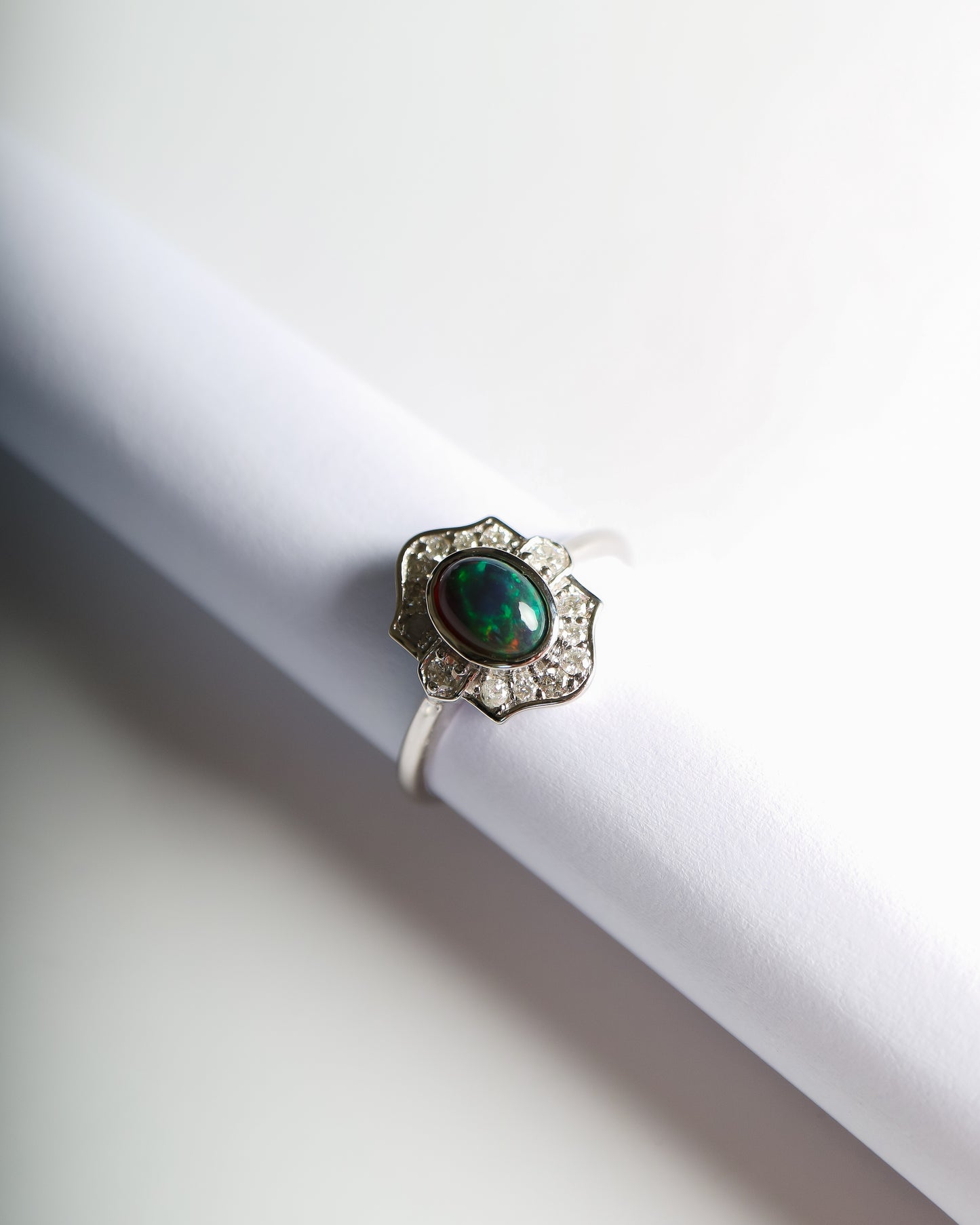 9ct white gold ring with Ethiopian opal and diamonds