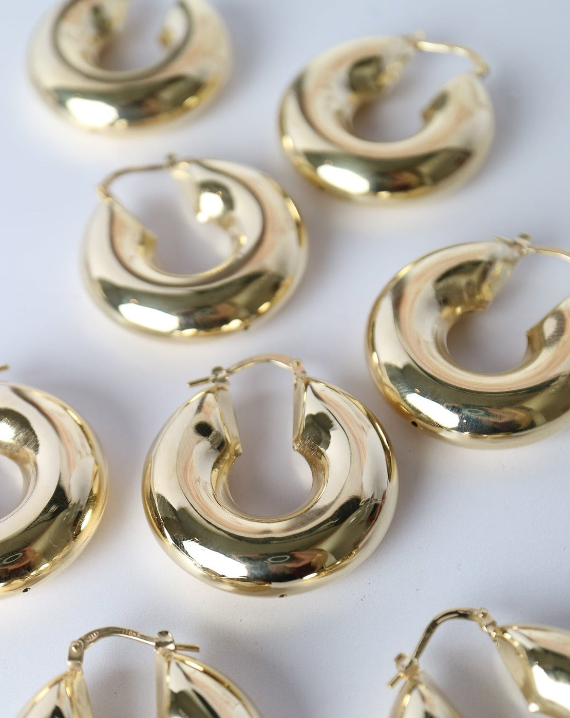 Puffed Statement Hoops in gold by Collective & Co. jewellery