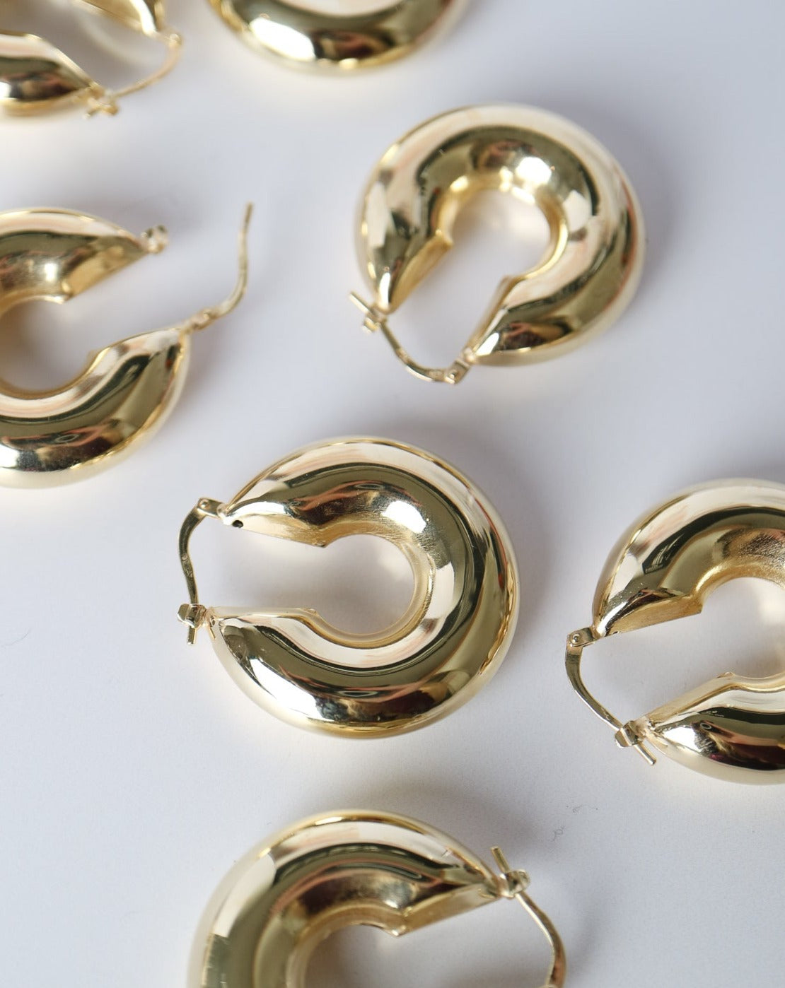 Puffed Statement Hoops in gold by Collective & Co. jewellery