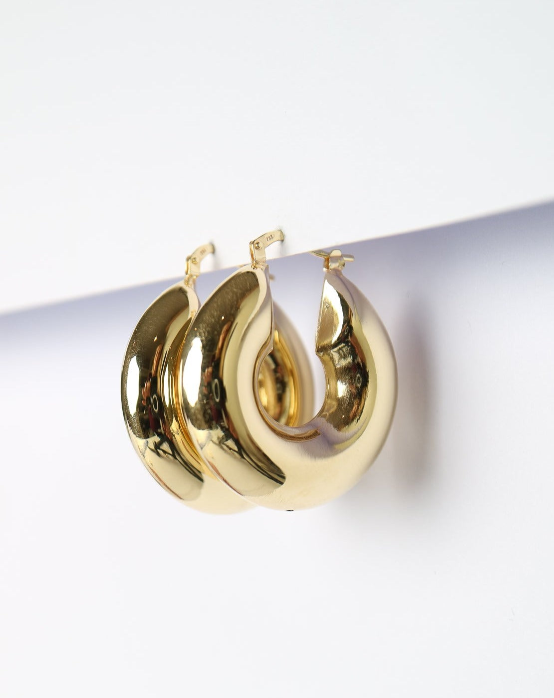 Puffed Statement Hoops in gold by Collective & Co. jewellery