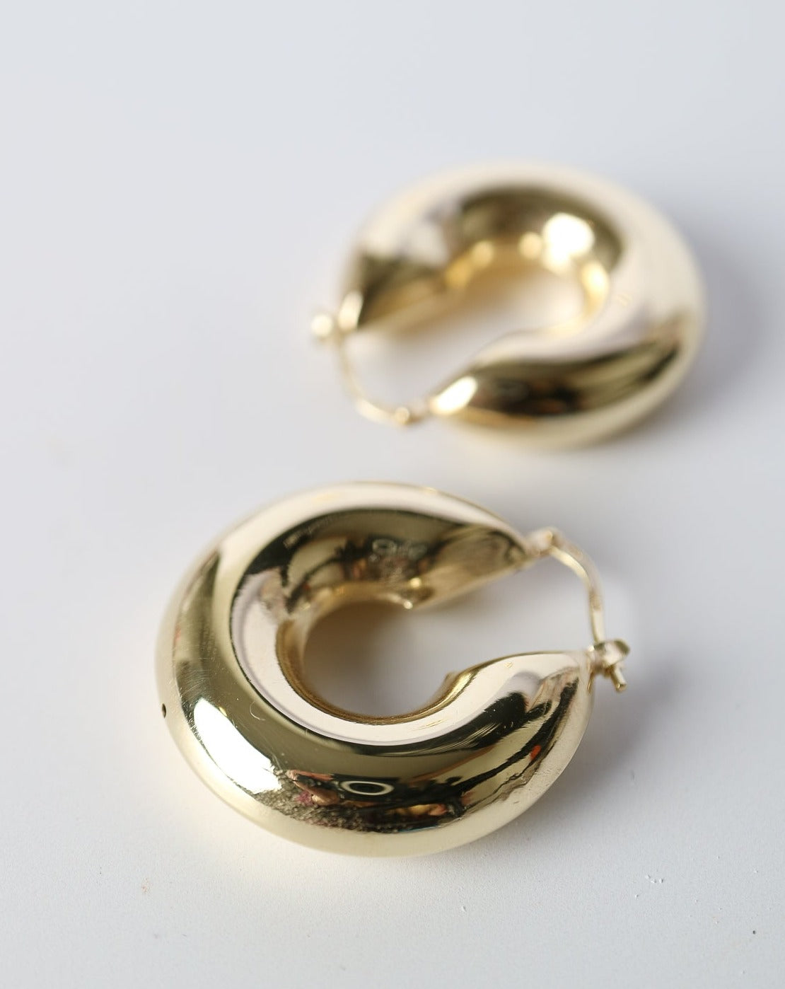 Puffed Statement Hoops in gold by Collective & Co. jewellery