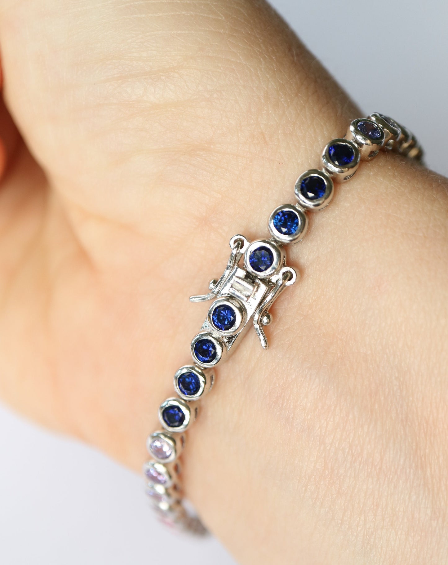 Rainbow coloured tennis bracelet in sterling silver