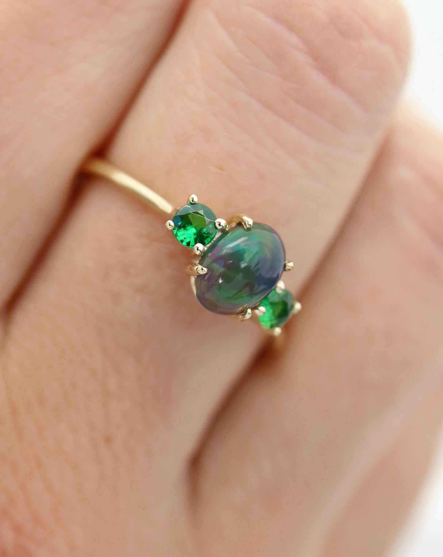9kt gold ring with Ethiopian opal and tsavorite