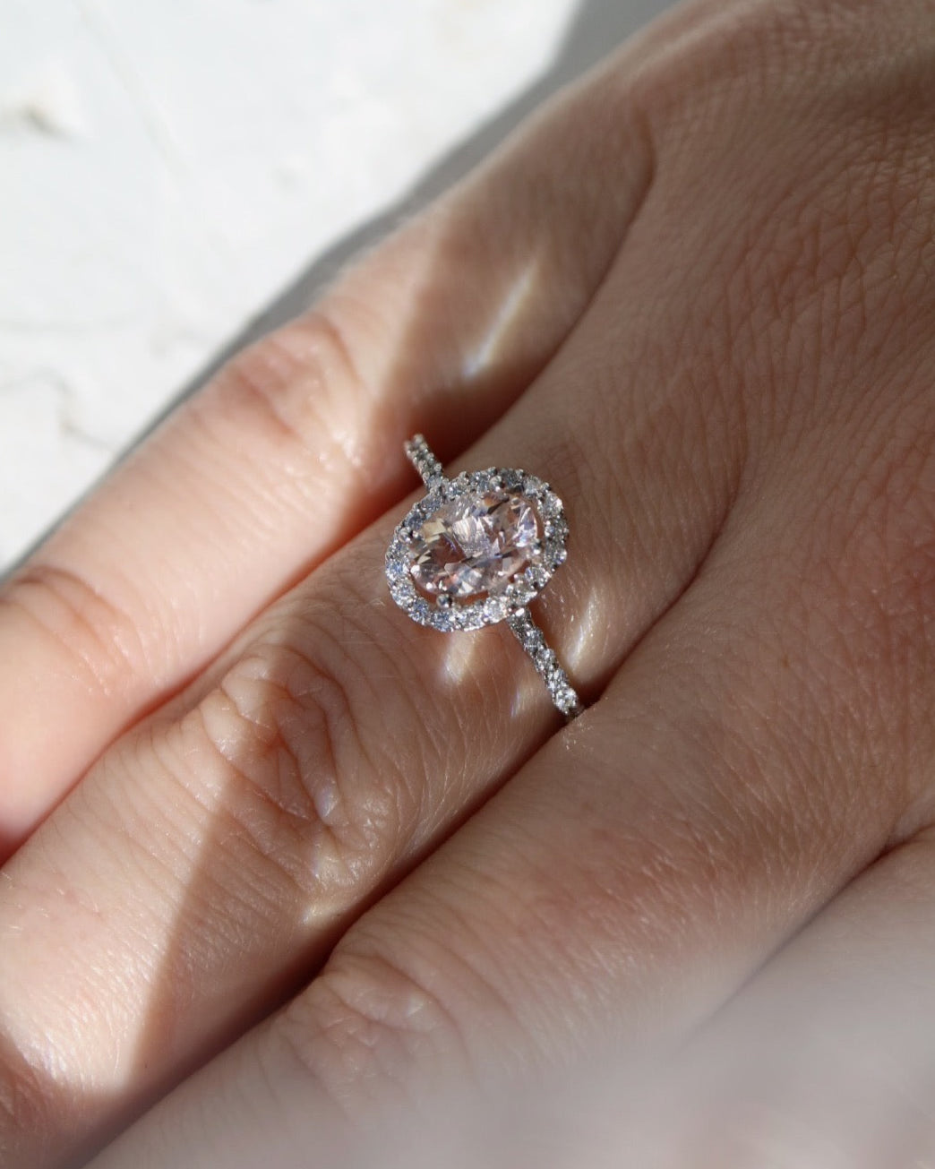 9kt white gold, morganite and diamond halo engagement ring