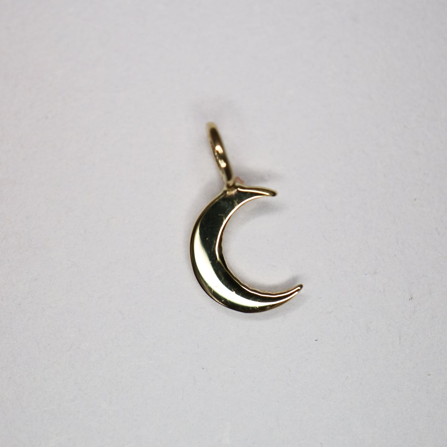 Crescent Charm in gold