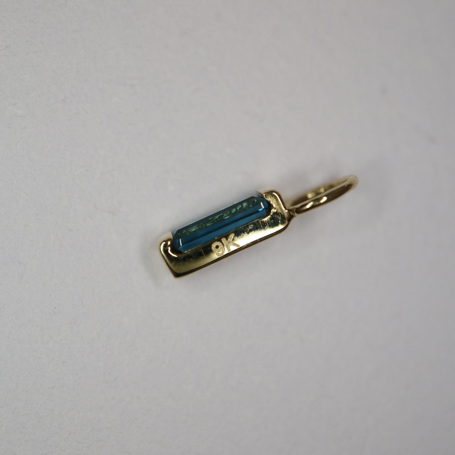 9ct gold london blue topaz baguette charm