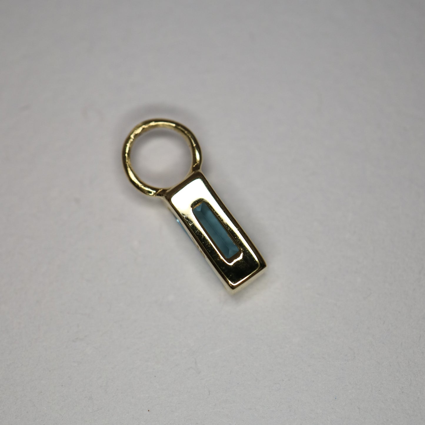 9ct gold london blue topaz baguette charm