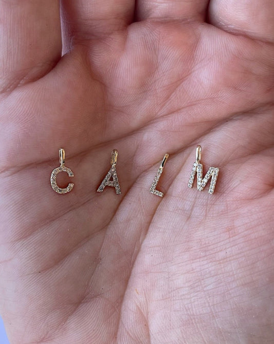 9kt gold and diamond initial pendants by Collective & Co.