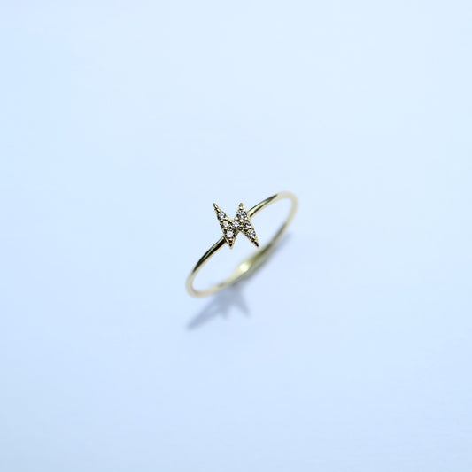 Gold ring with diamond lightning bolt 