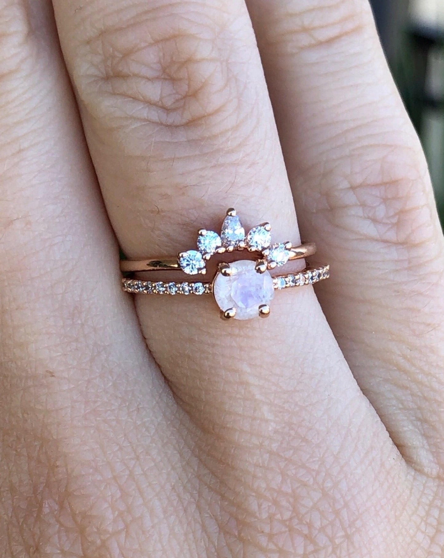 Rose gold, rainbow moonstone and diamond La Kaiser stacking ring on hand
