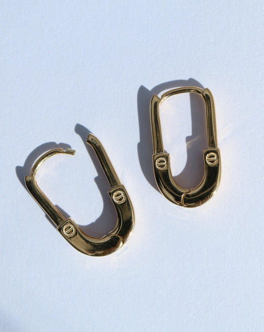 9kt gold oval huggie earrings