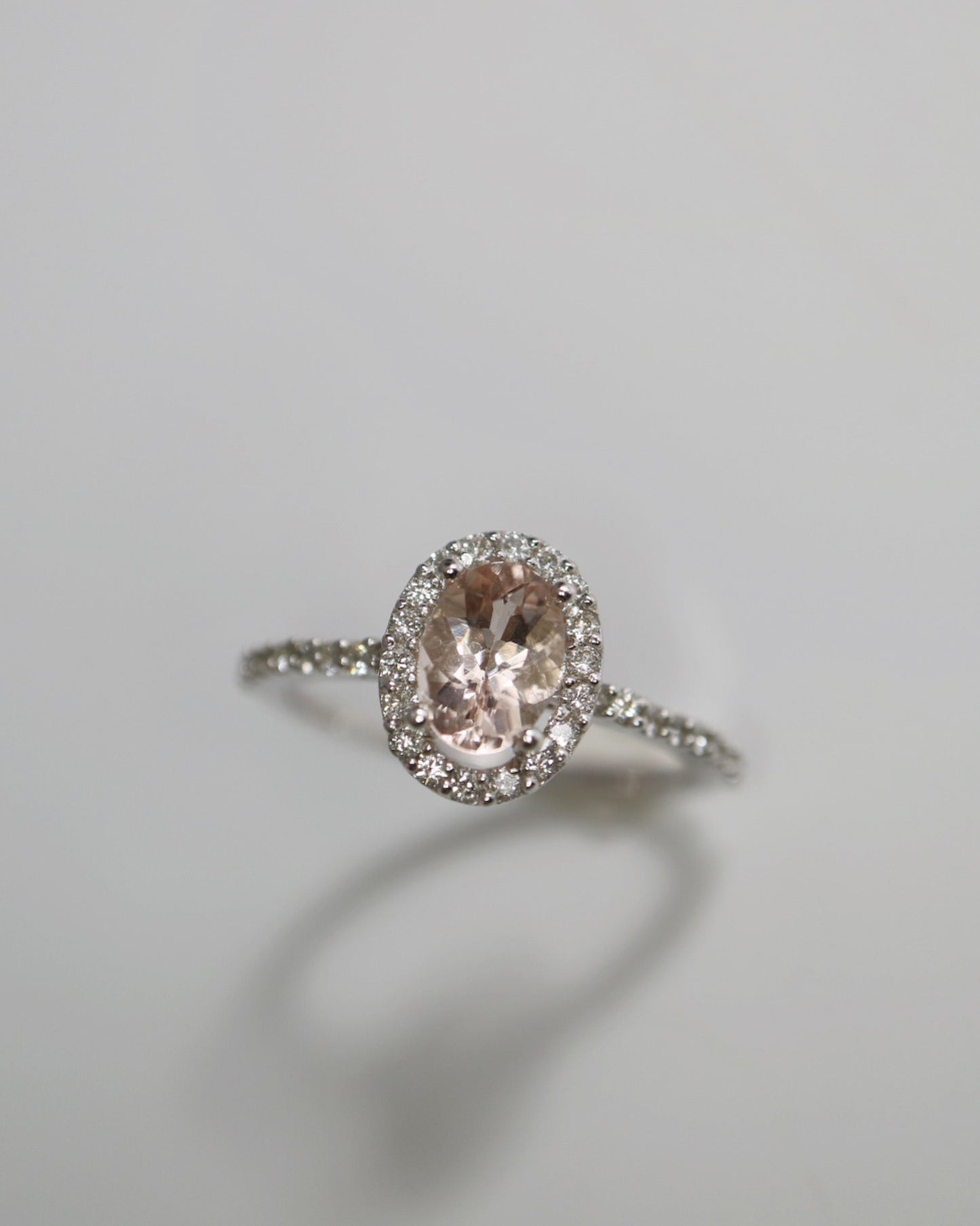 9kt white gold halo ring with Morganite and Diamonds