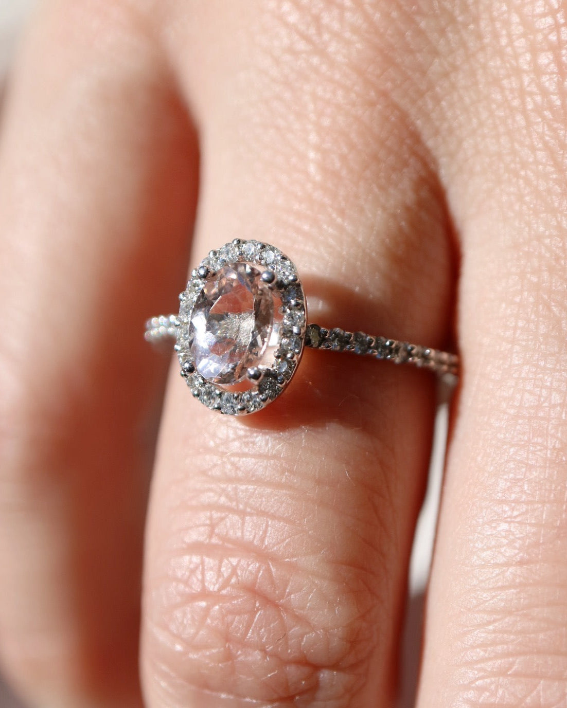 9ct white gold, morganite and diamond halo engagement ring