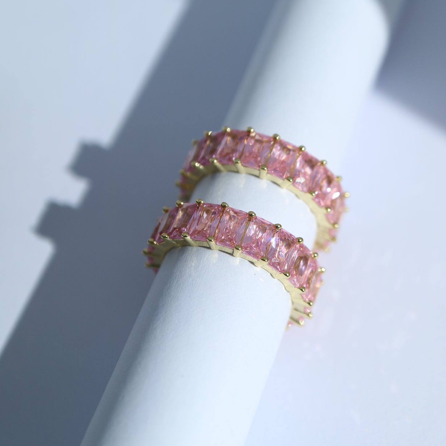 Rose coloured baguette eternity band