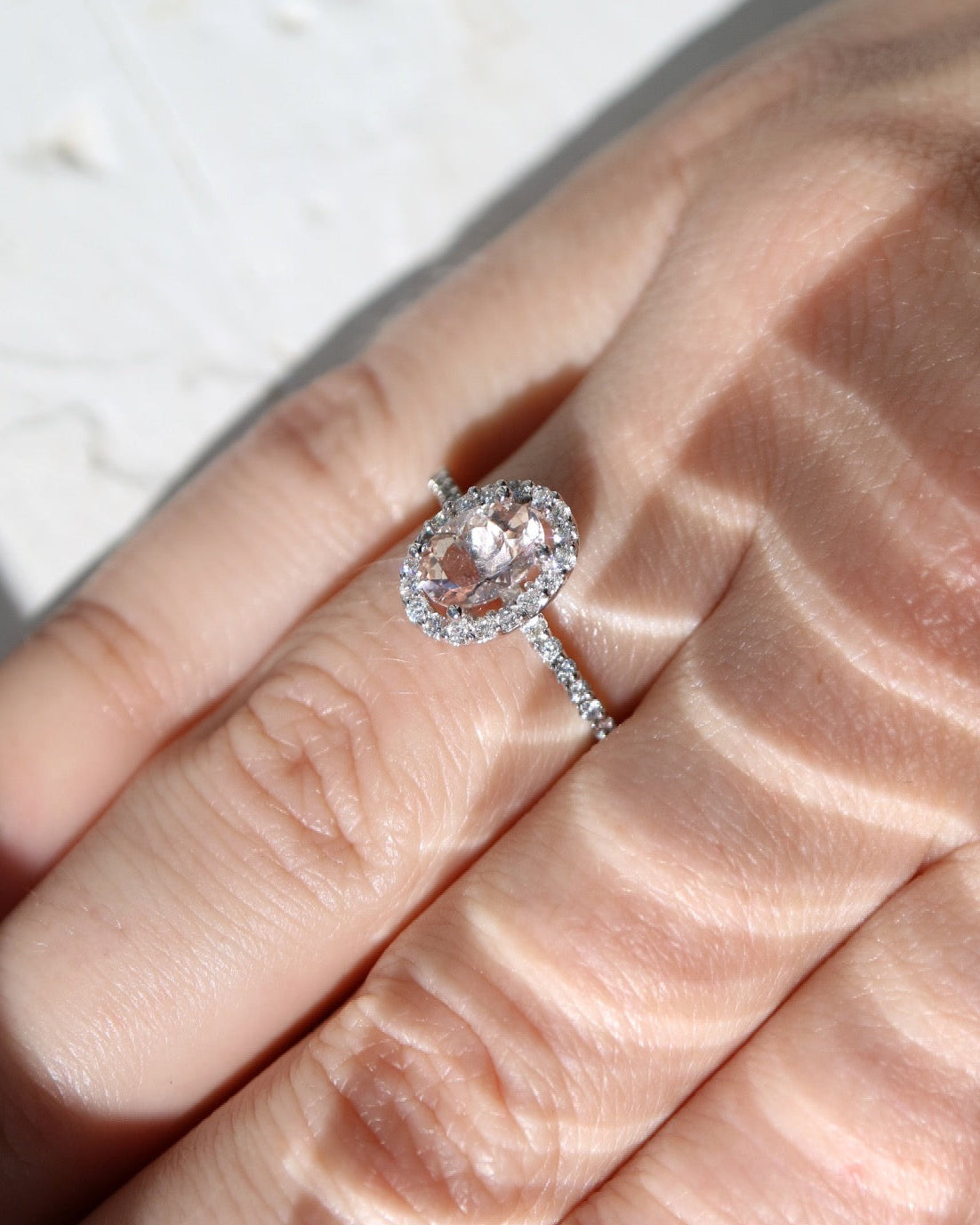 9kt white gold, morganite and diamond halo engagement ring