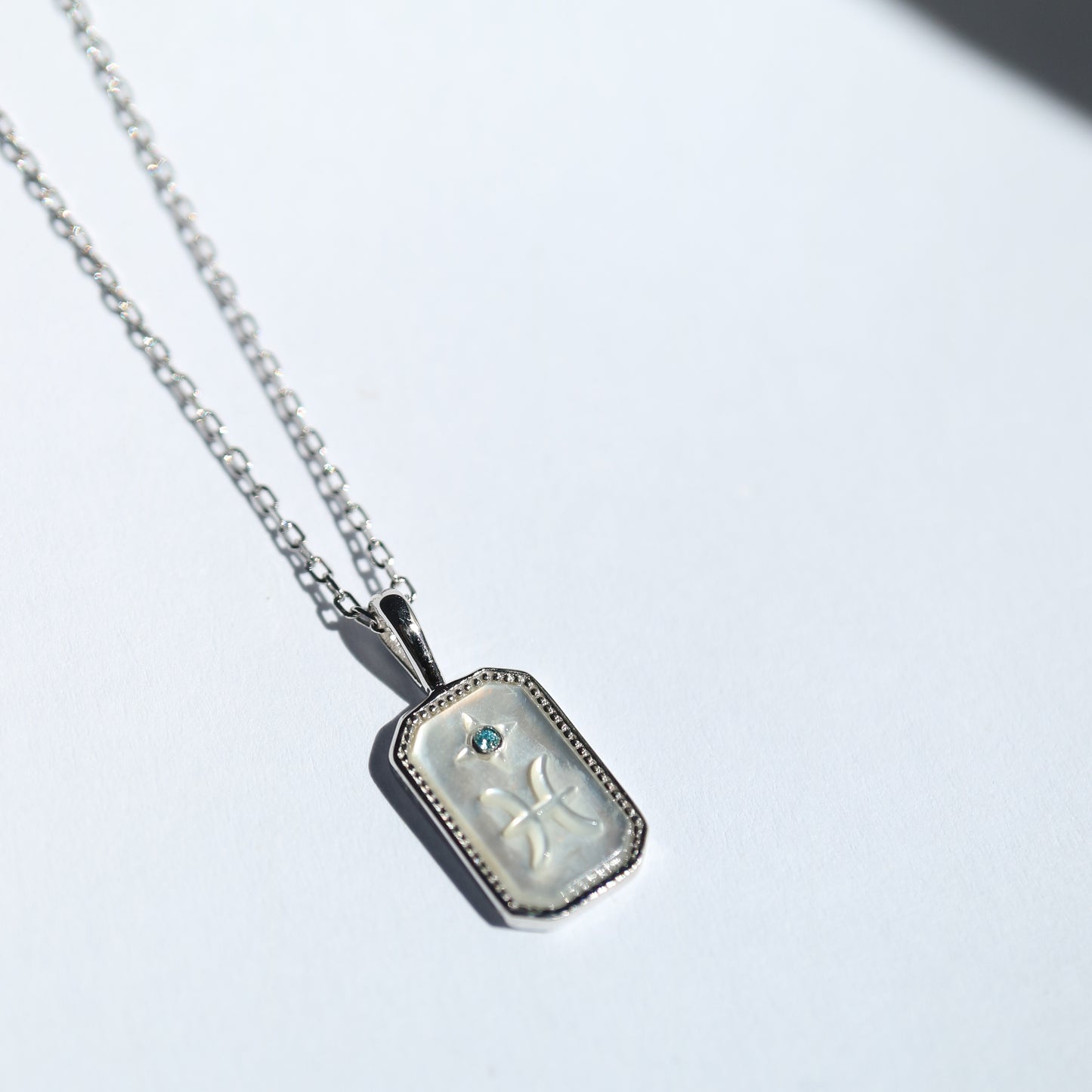 Star Sign Pendant in silver with Mother of Pearl