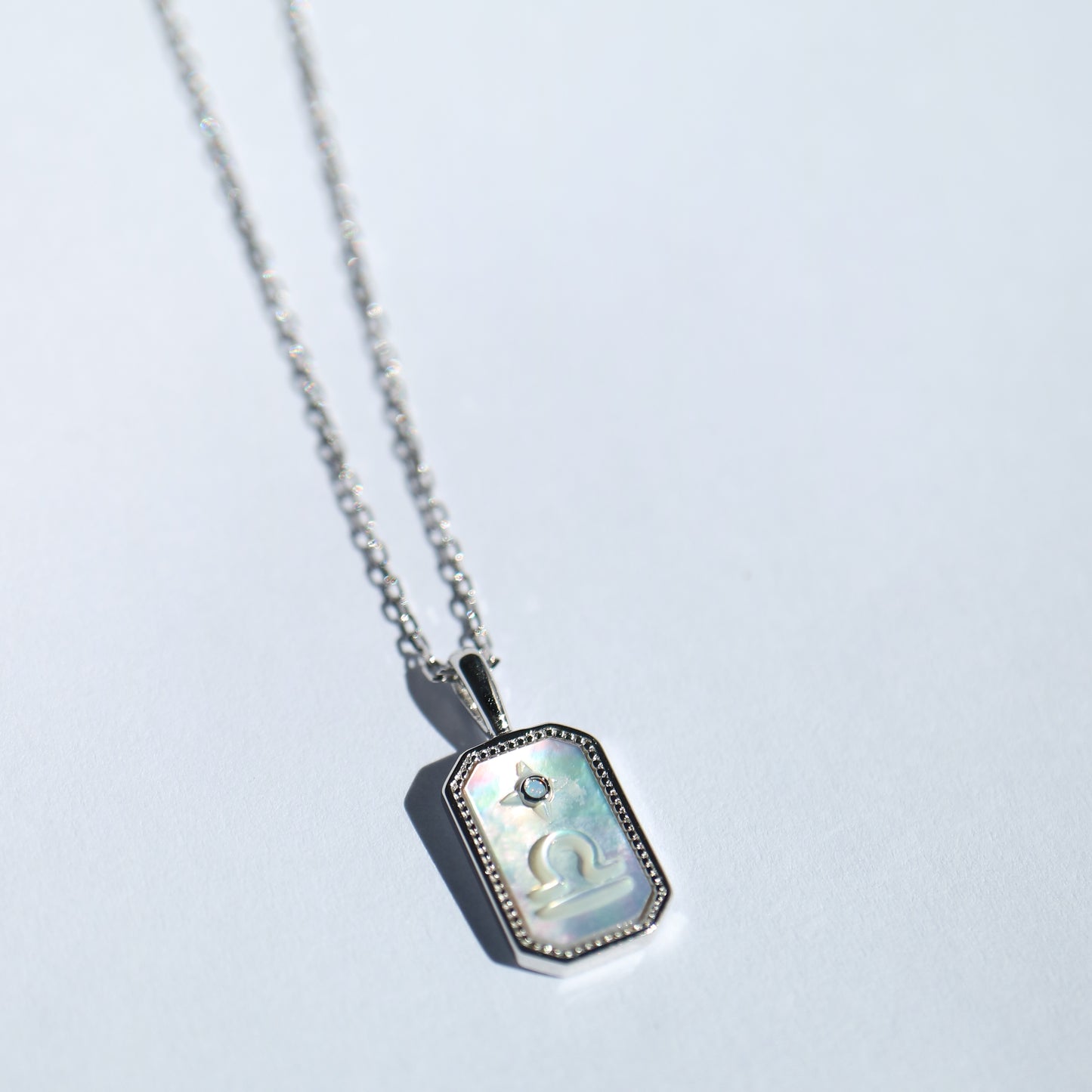 Star Sign Pendant in silver with Mother of Pearl