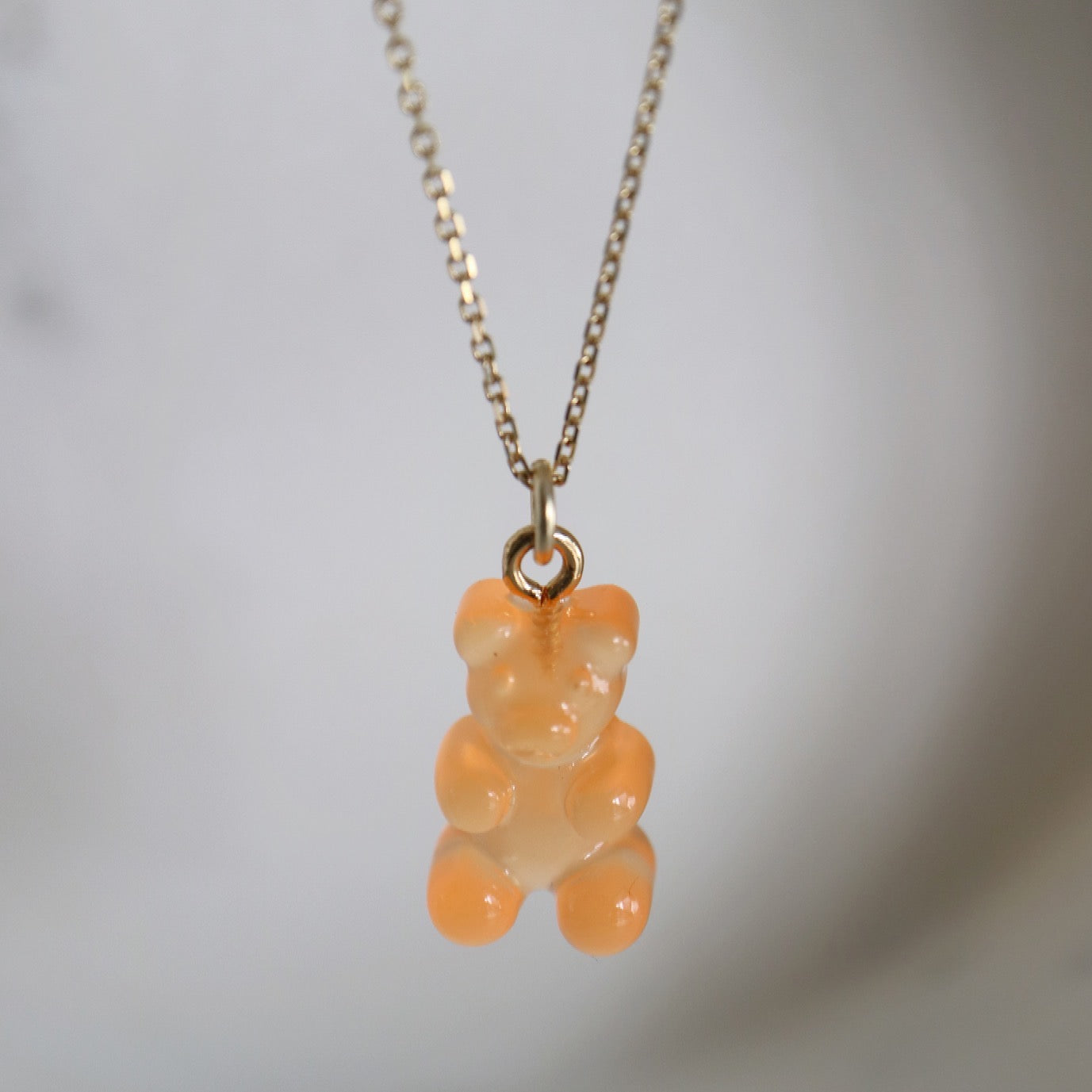 Gummy Bear on gold jumpring