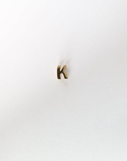 K initial charm letter pendant in 14kt gold
