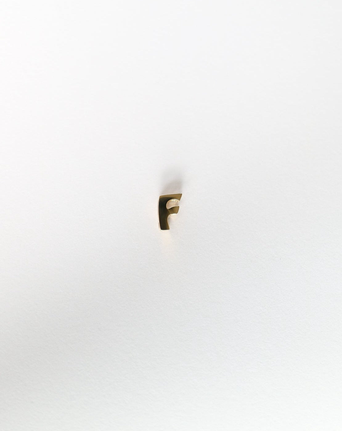 F initial charm letter pendant in 14kt gold