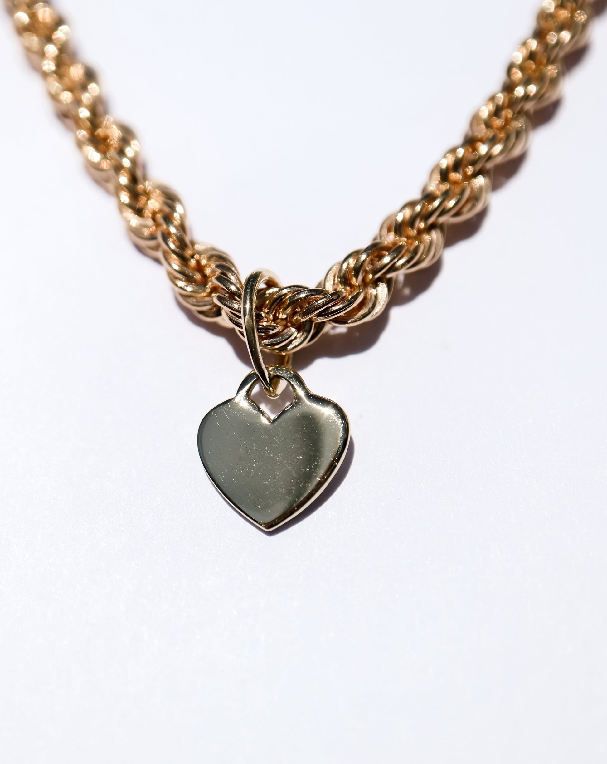 9ct gold Chunky Rope Bracelet with gold heart charm