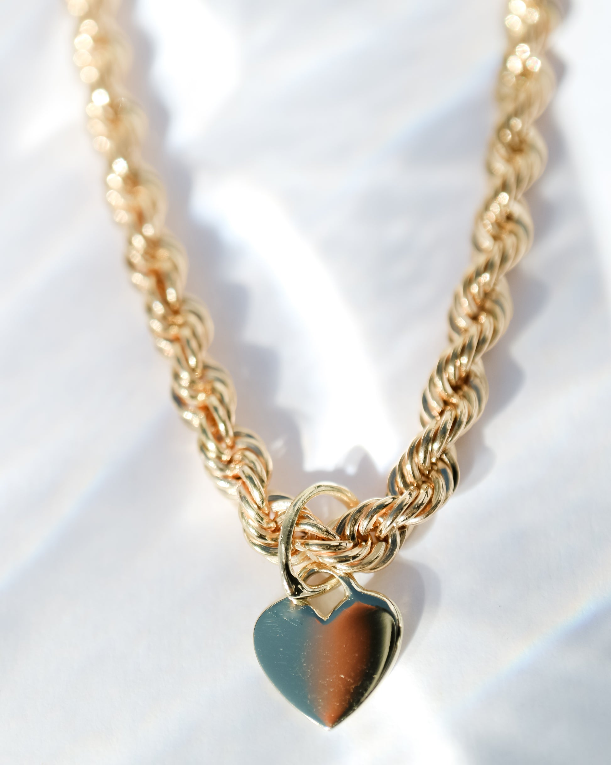 9ct gold Chunky Rope Bracelet with gold heart charm